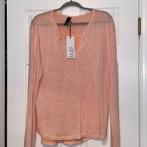 A very light shirt very causal and very cute.